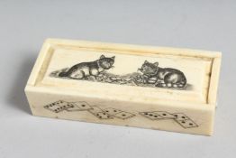 A BONE DICE BOX etched with cats. 4.5ins long.
