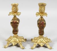 A GOOD PAIR OF 19TH CENTURY FRENCH BRONZE AND METAL CANDLESTICKS.