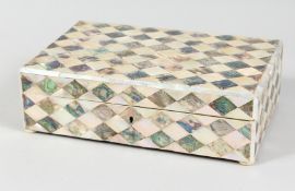 A GOOD MOTHER OF PEARL STYLE RECTANGULAR CASKET. 10ins long, 6.5ins wide.