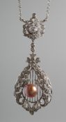 A GOOD 18CT WHITE GOLD AND DIAMOND PENDANT AND CHAIN.