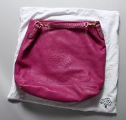 A PINK MULBERRY BAG.
