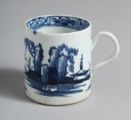 A BOW COFFEE CUP painted in underglaze blue with tall rocks and a bridge.