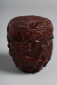 A JAPANESE CARVED WOOD BOX. 2.75ins. Signed.