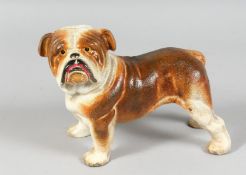 A CAST IRON DOOR STOP DOG.