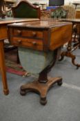 A 19th century rosewood drop-flap two drawer pedestal worktable.