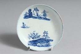 A SCARCE BOW SAUCER painted in light blue with the two-storied shelter.