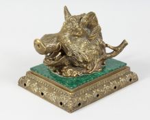 A GOOD BRONZE AND MALACHITE BOAR'S HEAD INKSTAND. 7ins long.