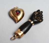 A GOLD CLENCHED FIST AND HAND.