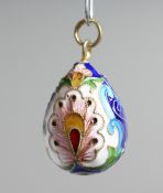 A RUSSIAN SILVER AND ENAMEL EGG PENDANT