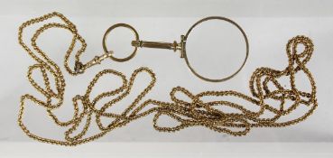 A MAGNIFYING GLASS AND CHAIN.