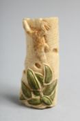 A BONE FROG ON A BRANCH NETSUKE 2.25ins long.
