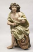 A VERY GOOD LARGE ITALIAN CARVED AND PAINTED FIGURE with a drape and holding a dove.