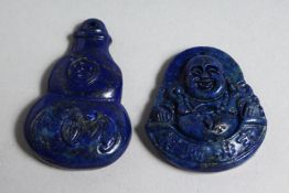 TWO CARVED LAPIS PENDANTS