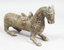 AN ARCHAIC BRONZE HORSE. 12ins.