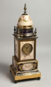 A VERY GOOD 19TH CENTURY VIENNA PORCELAIN CLOCK with metal supports and painted panels with cupids