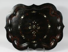 A LARGE VICTORIAN BLACK PAPIER MACHE TRAY with mother of pearl inlay. 30ins x 23 ins.