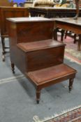 A set of 19th century mahogany and leather inset three tread library steps with storage.