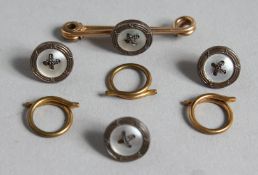 A SET OF VICTORIAN MOTHER OF PEARL AND AMETHYST STUDS in original box.