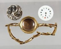 A LARGE I8CT GOLD WRISTWATCH. 12gms.