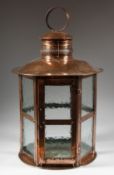 A GOOD EDWARDIAN SHEET COPPER GLASS HANGING CIRCULAR LANTERN.