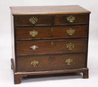 A GEORGE III MAHOGANY STRAIGHT FRONT CHEST with two short and three long graduated drawers on
