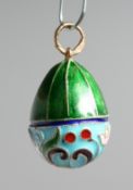 A RUSSIAN SILVER AND ENAMEL EGG PENDANT.