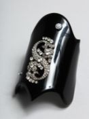 A VINTAGE DEPY CHANDRIS BAKELITE BANGLE.