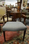 A George III mahogany elbow chair.