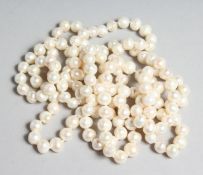 A LONG PEARL NECKLACE