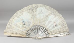 A GOOD VICTORIAN MOTHER OF PEARL AND LACE FAN painted with figures. 26ins open, in a box. J