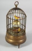 A SINGING BIRD CAGE CLOCK. 7ins high.