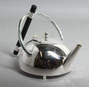 A CHRISTOPHER DRESSER DESIGN CIRCULAR, PLATED TEAPOT.