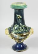 A PALISSY TYPE MAJOLICA VASE with moths entwined snakes with garlands and lion ring handles. 15ins