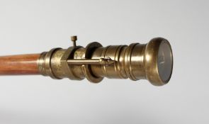 A WALKING STICK 'Telescope and compass'. 38ins long.