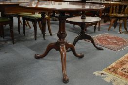 A good George III mahogany circular tilt top tripod table with bird-cage action.