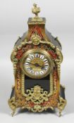 A GOOD 19TH CENTURY FRENCH GILT METAL BOULLE CLOCK with ornate numerals. 16ins high.