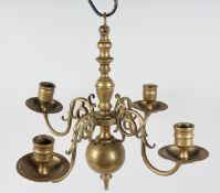 A SMALL 18TH - 19TH CENTURY, POSSIBLY DUTCH, FOUR BRANCH WALL LIGHT. 14ins diameter.