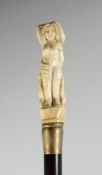 A CARVED BONE HANDLE WALKING STICK 