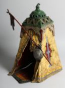 A GOOD AUSTRIAN PAINTED COLD CAST ARAB TENT, a seated figure inside. 13ins high.