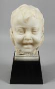 A GOOD ITALIAN CARED WHITE MARBLE BUST OF A CHILD. 8.5ins high.
