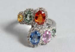 A GOOD 18CT WHITE GOLD MULTICOLOURED SAPPHIRE RING.