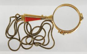 A PAIR OF FOLDING SPECTACLES on a chain.