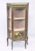 A SMALL LOUIS XVI STYLE VITRINE with brass grill and painted glass sides, on curving legs. 4ft