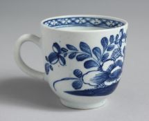 A BOW COFFEE CUP painted with a bird and flowers, the interior with a diaper border.