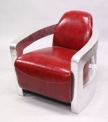 AN UNUSUAL ART DECO STYLE ALUMINIUM AND RED LEATHER UPHOLSTERED ARMCHAIR