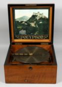A GOOD SQUARE CASED 19TH CENTURY POLYPHONE. 11 inch discs (4). 14ins square.