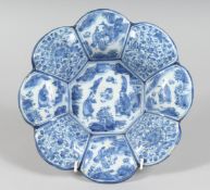 A 19TH CENTURY BLUE AND WHITE DEEP CHARGER with Chinese design. 9ins diameter
