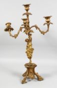 A GOOD 19TH CENTURY FRENCH GILDED BRONZE CANDELABRA with a classical female figure holding three