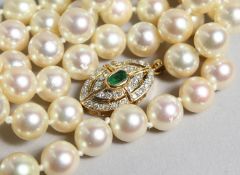 A VERY GOOD STRING OF FIFTY FOUR PEARLS with gold clasp.