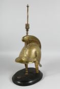 AN INTERESTING BRASS FIREMAN'S HELMET as a lamp 17ins high.